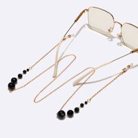 Gold-colored metal non-slip chain, with black crystal, for glasses and masks GL1578