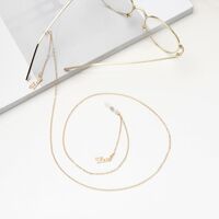 Металлическая нескользящая цепочка золотого цвета, с текстом 