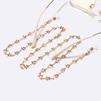 Gold-colored metal non-slip chain, with copper star, for glasses and masks GL1600