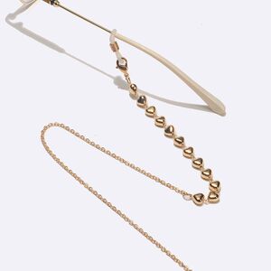 Gold-colored metal non-slip chain, with gold heart, for glasses and masks GL1566