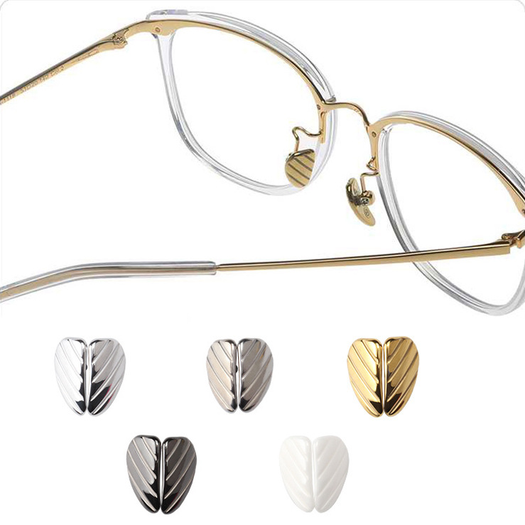 Носоупор керамический в форме ракушки, 14*8 мм