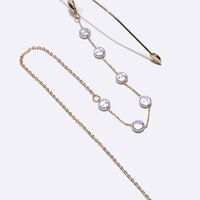 Gold-colored metal non-slip chain, with pearl, for glasses and masks GL1395