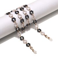 Metal non-slip chain, with pearl black and white flower, for glasses and masks GL1467