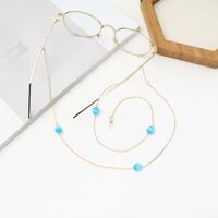 Gold-colored metal non-slip chain, with blue cat's eye beads, for glasses and masks GA049