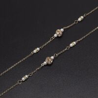 Gold-colored metal non-slip chain, with rhinestones and pearls, for glasses and masks GL553