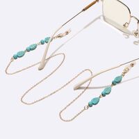 Gold-colored metal non-slip chain, with turquoise leavs and beads, for glasses and masks GL1742