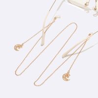 Gold-colored metal non-slip chain, with pearl moon pendant, for glasses and masks GL1525