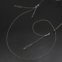 Gold-colored metal non-slip chain, with pendant fishbone, for glasses and masks GL695