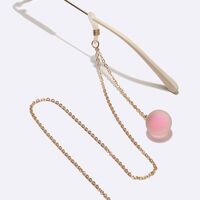Gold-colored metal non-slip chain, with a matte pink ball pendant, for glasses and masks GL1483