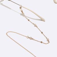 Gold-colored metal non-slip chain, with round gold and pearl, for glasses and masks GL1535