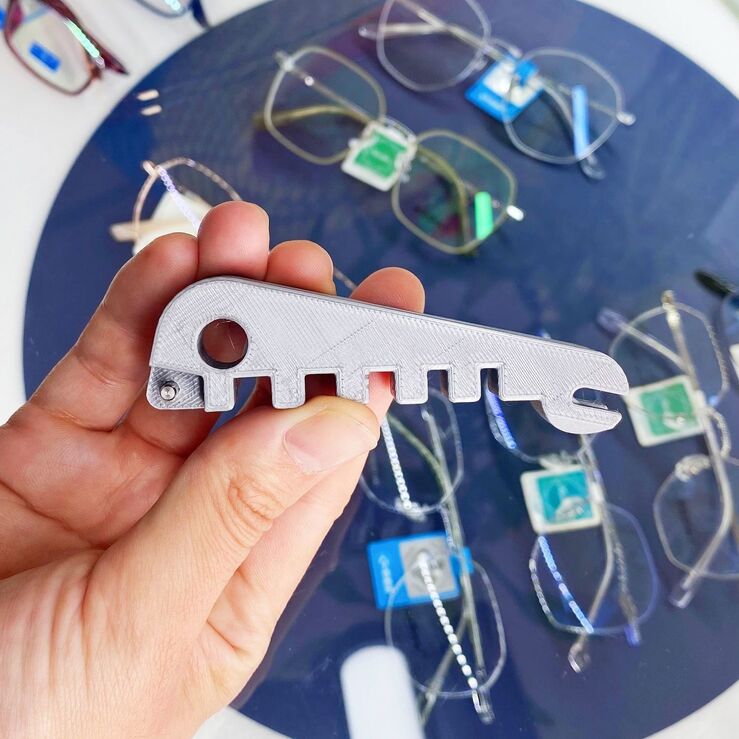 Frame adjuster for bending the bridge of the nose and temples, for straightening and restoring the shape of frames