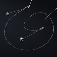 Metal non-slip chain, with pendant crow with pearl, for glasses and masks GL880