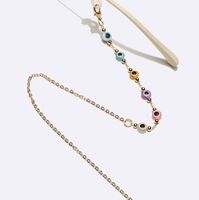Gold-colored metal non-slip chain, with colored glasses eyes, for glasses and masks GL1703