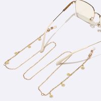 Gold-colored metal non-slip chain, with white daisy, for glasses and sweater GL1552