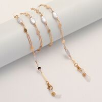 Gold-colored metal non-slip chain, with deformed pearls oval, for glasses and masks GL1865