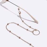 Gold-colored metal non-slip chain, with rings and beads, for glasses and masks GL1025