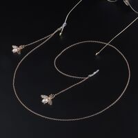 Gold-colored metal non-slip chain, with pendant bee and pearl, for glasses and masks GL930