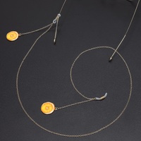 Gold-colored metal non-slip chain, with pendant orange, for glasses and masks GL657