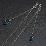 Gold-colored metal non-slip chain, with pendant blue cats eye, for glasses and masks GL471