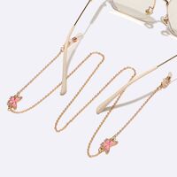 Gold-colored metal non-slip chain, with pink butterfly, for glasses and masks GL1576