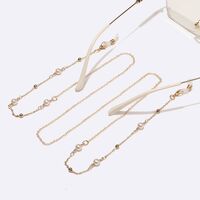 Gold-colored metal non-slip chain, with round gold and pearl, for glasses and masks GL1535