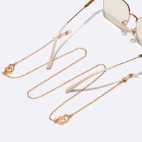 Gold-colored metal non-slip chain, with heart and rhinestones, for glasses and masks GL1575