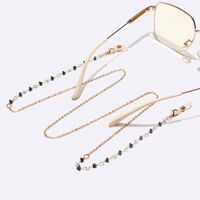 Gold-colored metal non-slip chain, with black and white crystal, for glasses and masks GL1595