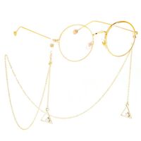 Gold-colored metal non-slip chain, with a triangle pendant with rhinestones, for glasses and masks GL384