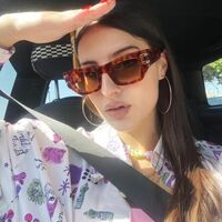 Plastic sunglasses in the shape of a 