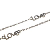 Bronze-colored metal non-slip chain, with the text 