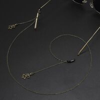 Bronze-colored metal non-slip chain, with skeleton pendant, for glasses and masks GL469
