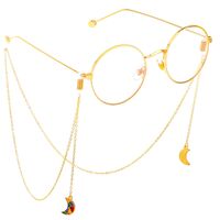 Gold-colored metal non-slip chain, with pendant moon, for glasses and masks GL353