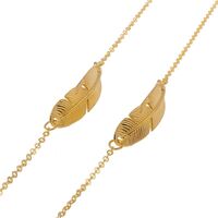 Gold-colored metal non-slip chain, with a feather, for glasses and masks GL041
