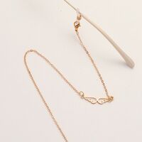 Gold-colored metal non-slip chain, with wings, for glasses and masks GL1870