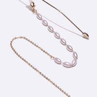 Gold-colored metal non-slip chain, with pearl, for glasses and masks GL1414