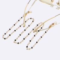Gold-colored metal non-slip chain, with black and white triangle crystal, for glasses and masks GL1639