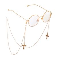 Gold-colored metal non-slip chain, with pendant cross with rhinestones, for glasses and masks GL756