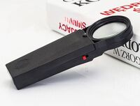 Black magnifying glass 50 mm with illumination 1056