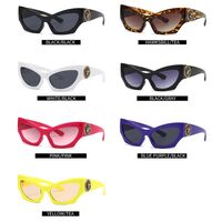 Plastic sunglasses in the shape of a 