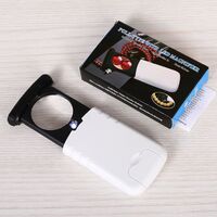 Folding magnifier with universal backlight 93708-XX, dimensions: ⌀37 mm. Magnification: 8Х