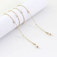 Gold-colored metal non-slip chain, with oval pearl, for glasses and masks GL992