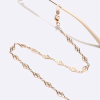 Gold-colored metal non-slip chain, with hollow diamond, for glasses and masks GL1614