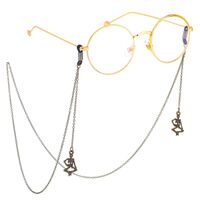 Bronze-colored metal non-slip chain, with skeleton pendant, for glasses and masks GL469