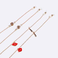 Set of two golden glasses chain with peach and turquoise hearts GM059