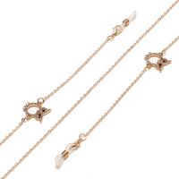 Gold-colored metal non-slip chain, with owl with rhinestone, for glasses and masks GL1446
