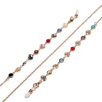 Gold-colored metal non-slip chain, with copper butterfly and colorful crystal, for glasses and masks GL1290