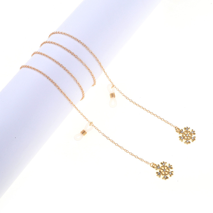 Gold-colored metal non-slip chain, with pendant snowflake with rhinestone, for glasses and masks GL806