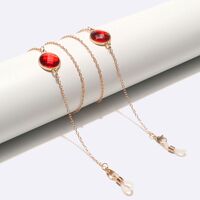 Gold-colored metal non-slip chain, with red crystals, for glasses and masks GL1604