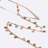 Gold-colored metal non-slip chain, with colorful small daisy, for glasses and masks GL1586