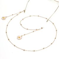 Gold-colored metal non-slip chain, with daisy and beads, for glasses and masks GL1023